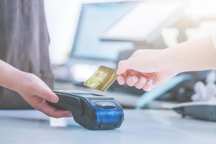 Card payment with chip and pin machine in shop